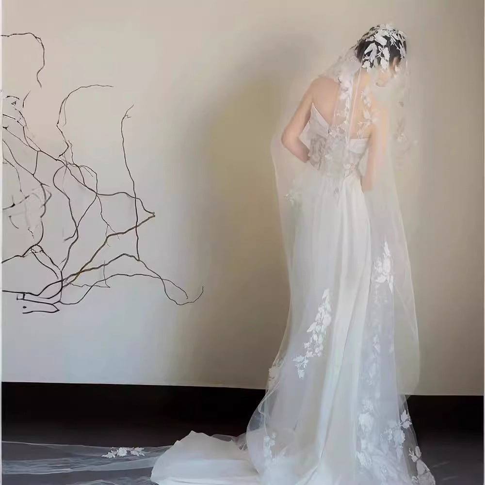 Robe de mariée sirène en dentelle satinée