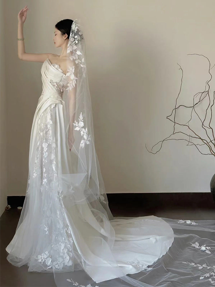 Robe de mariée sirène en dentelle satinée