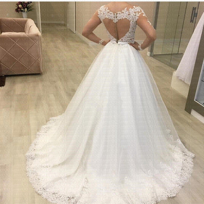 Robe de mariée à manches longues