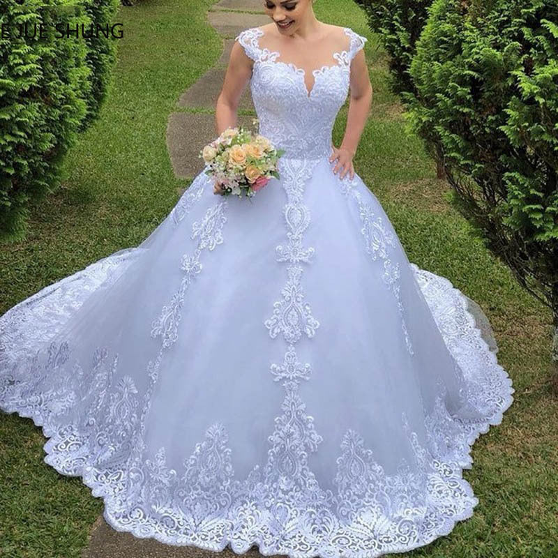 Robe de mariée en dentelle inspiration vintage