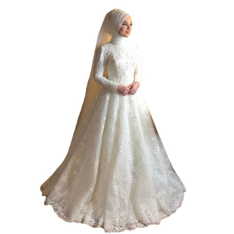 Robe de mariée blanche à manches longues