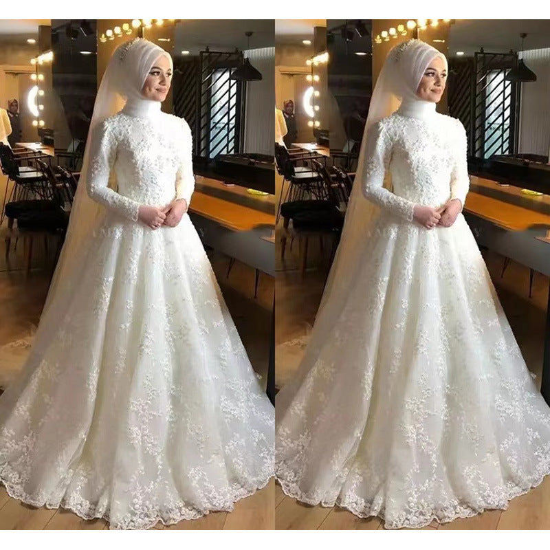 Robe de mariée blanche à manches longues