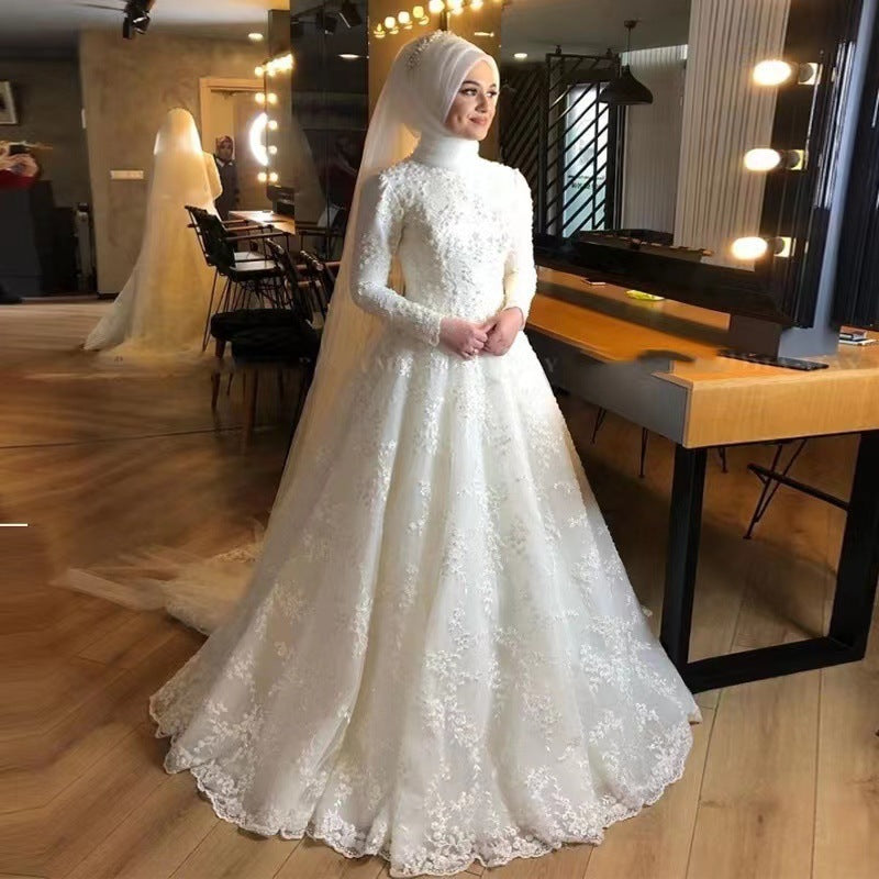 Robe de mariée blanche à manches longues